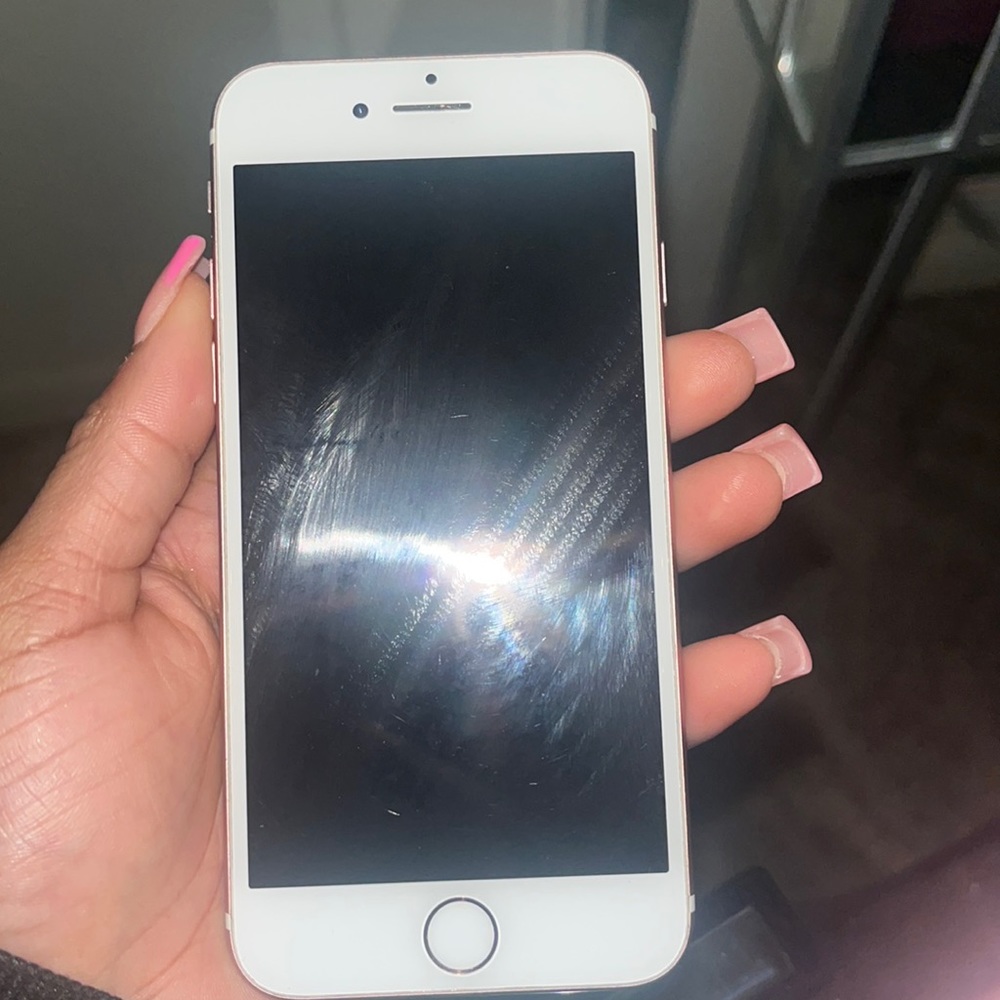 This iPhone 7 needs to be taken to a phone store, to reset it. In good condition